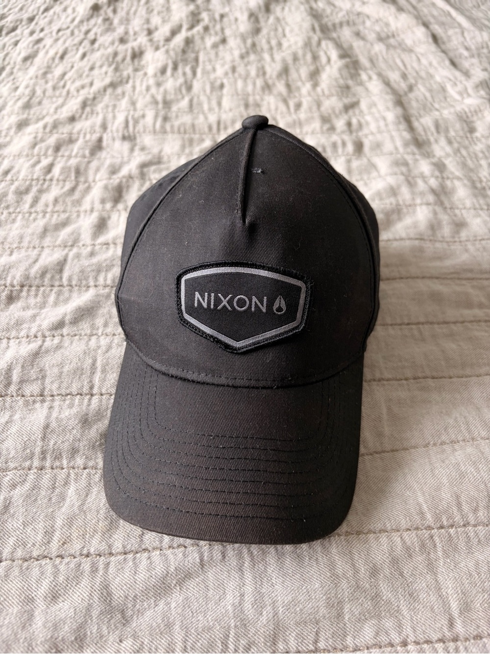 Nixon Black Logo Baseball Cap with Subtle Gray Patch